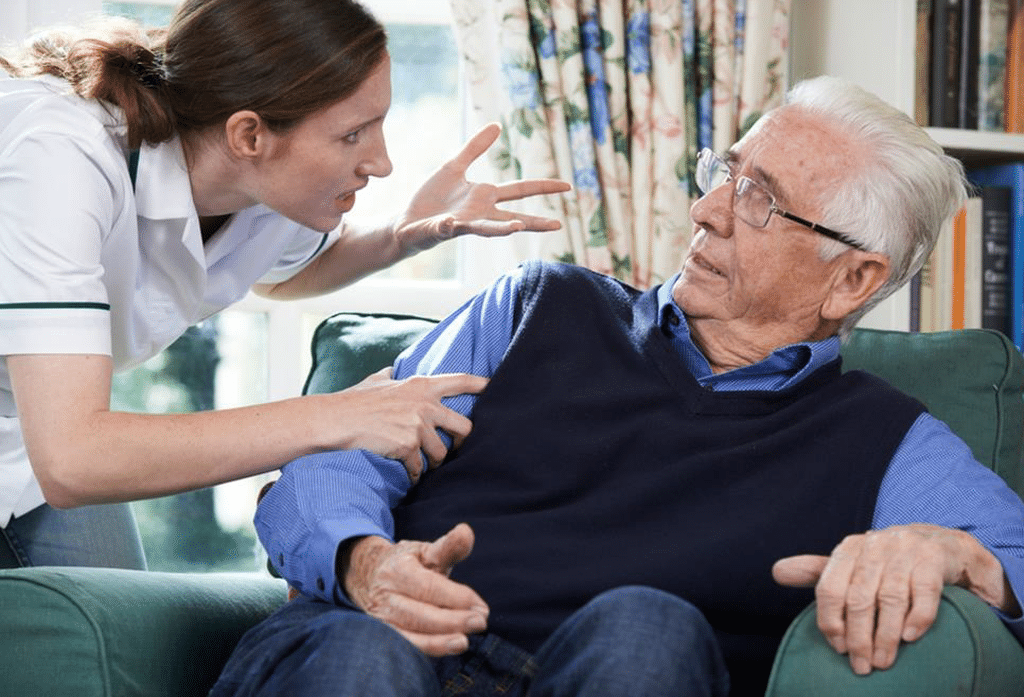 nurse walks a man through a rehab exercise