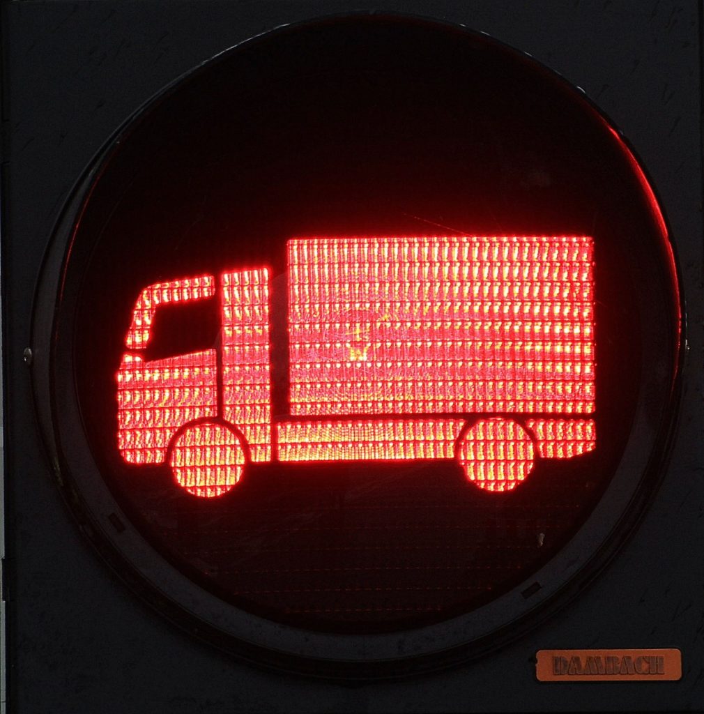red delivery vehicle sign